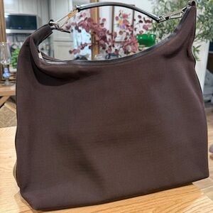 Vintage Gucci Jackie hobo bag in brown nylon with leather trim.